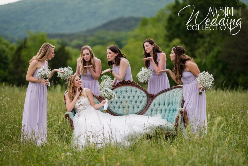Bride vintage sofa bridesmaids in field